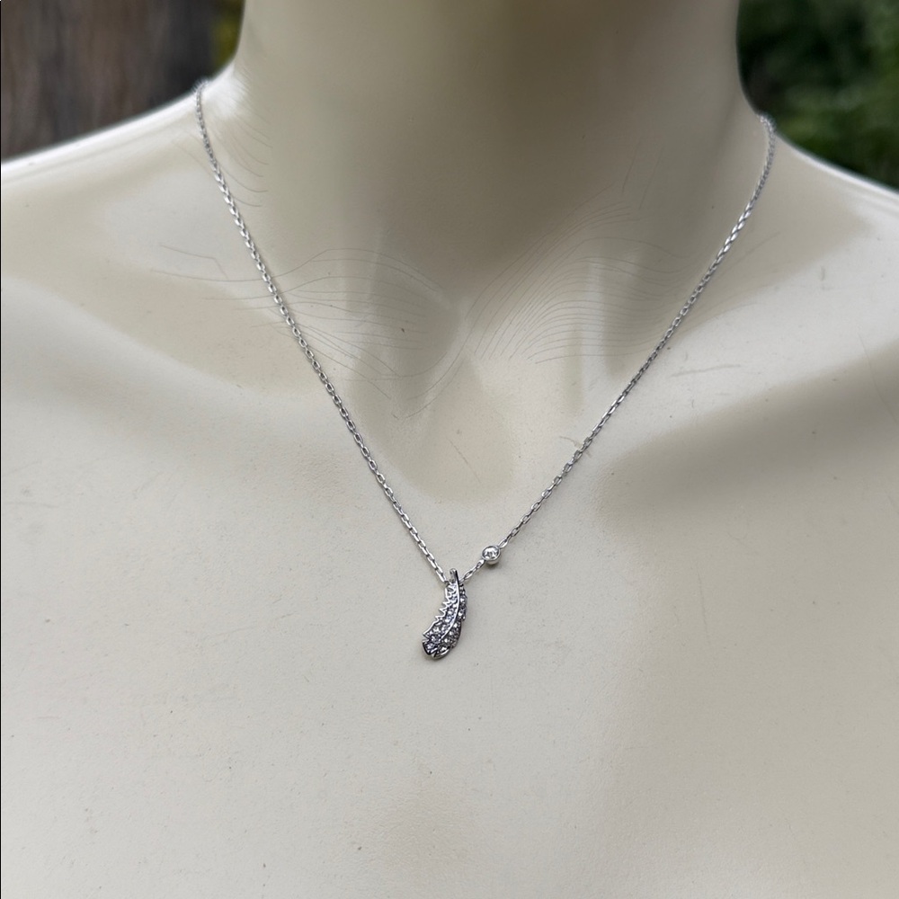 Swan signed Swarovski feather naughty ycrystal silver tone minimalist necklace